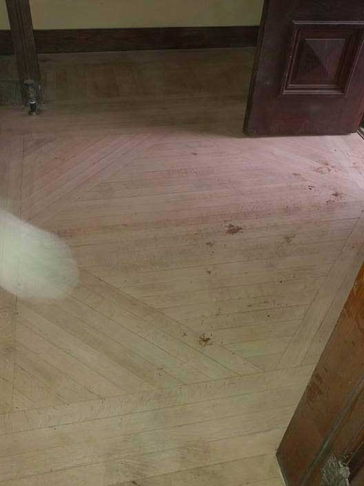 A newly installed, unstained wooden floor