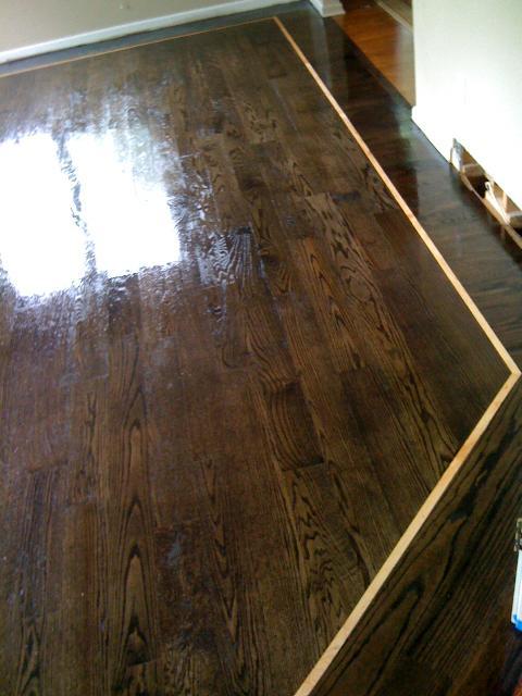 Glossy dark wood floor