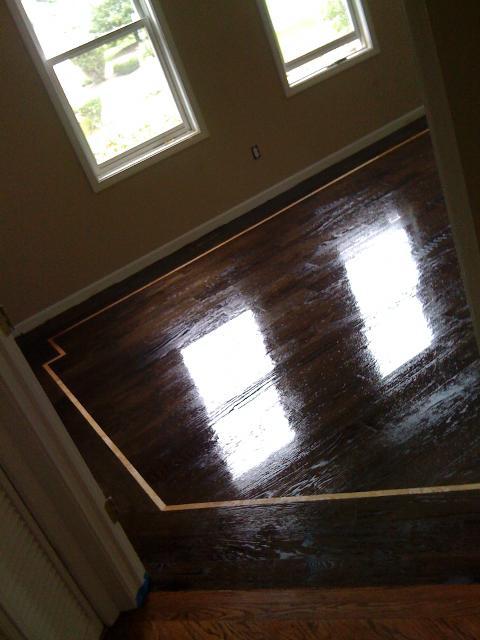 Glossy dark wood floor