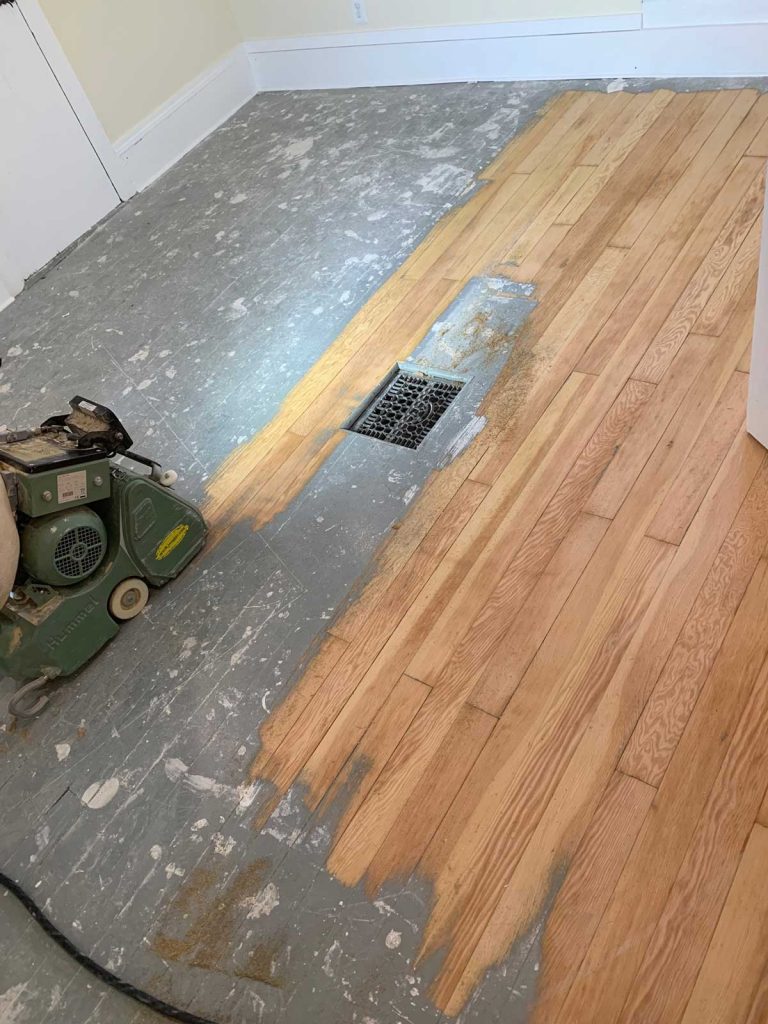 Hardwood floor being refinished